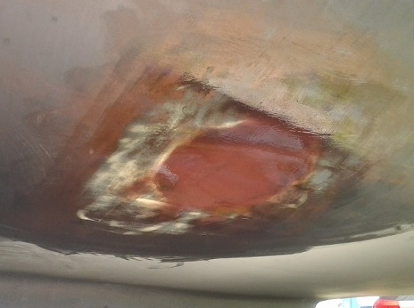 Irregularities filled, sanded flush and epoxy barrier coat applied.